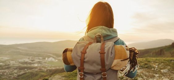 Woman with hiking backpack